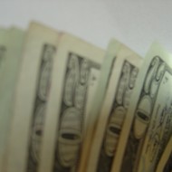 blurry photo of money - twenty dollar bills