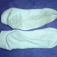 Clean Sock Dirty Sock photo of one clean sock and one dirty sock comparison
