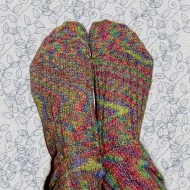 Feet in Colorful Socks phot of two feet wearing brightly colored pair of socks