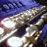 photo of silver flute in blue velvet flute case