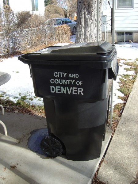 Photo of black city of Denver Municipal Garbage Trash can recepticle