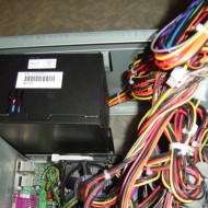photo of computer with wires and power supply showing