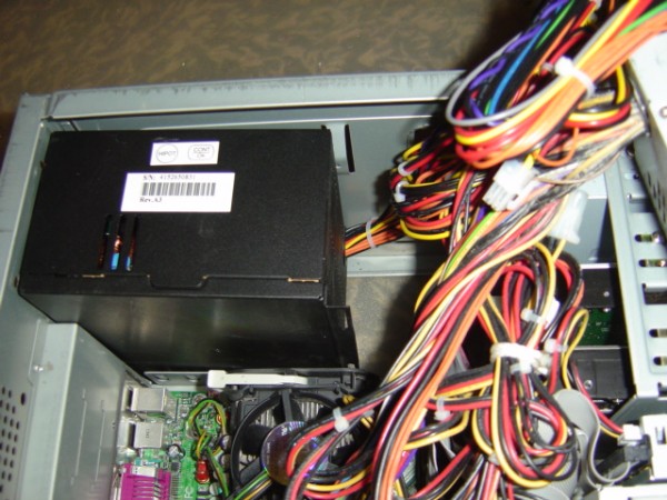photo of computer with wires and power supply showing