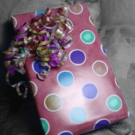 colorized photo of a birthday present on black and white background