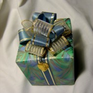 Present with Bow and Heart photo of wrapped package with a bow and a heart