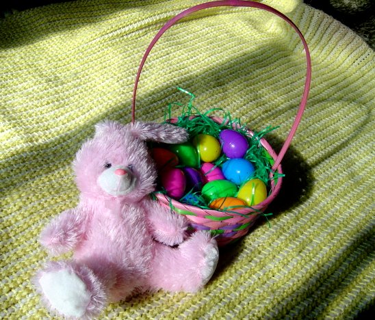 easter bunny with easter eggs in a basket. Stuffed Easter Bunny with