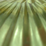 close up photo of a the grooves in a washboard