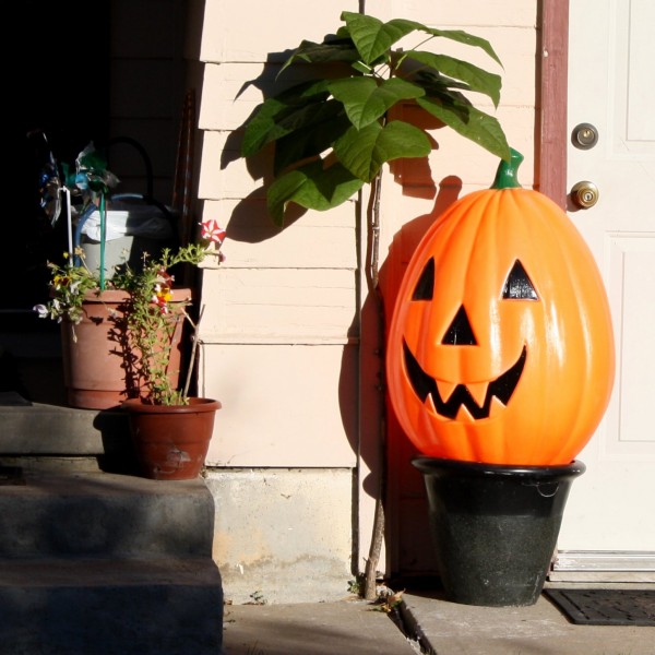 Free Photo of a plastic Halloween Pumpkin on a porch