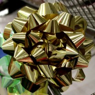 free high resolution photo of a gold colored gift bow