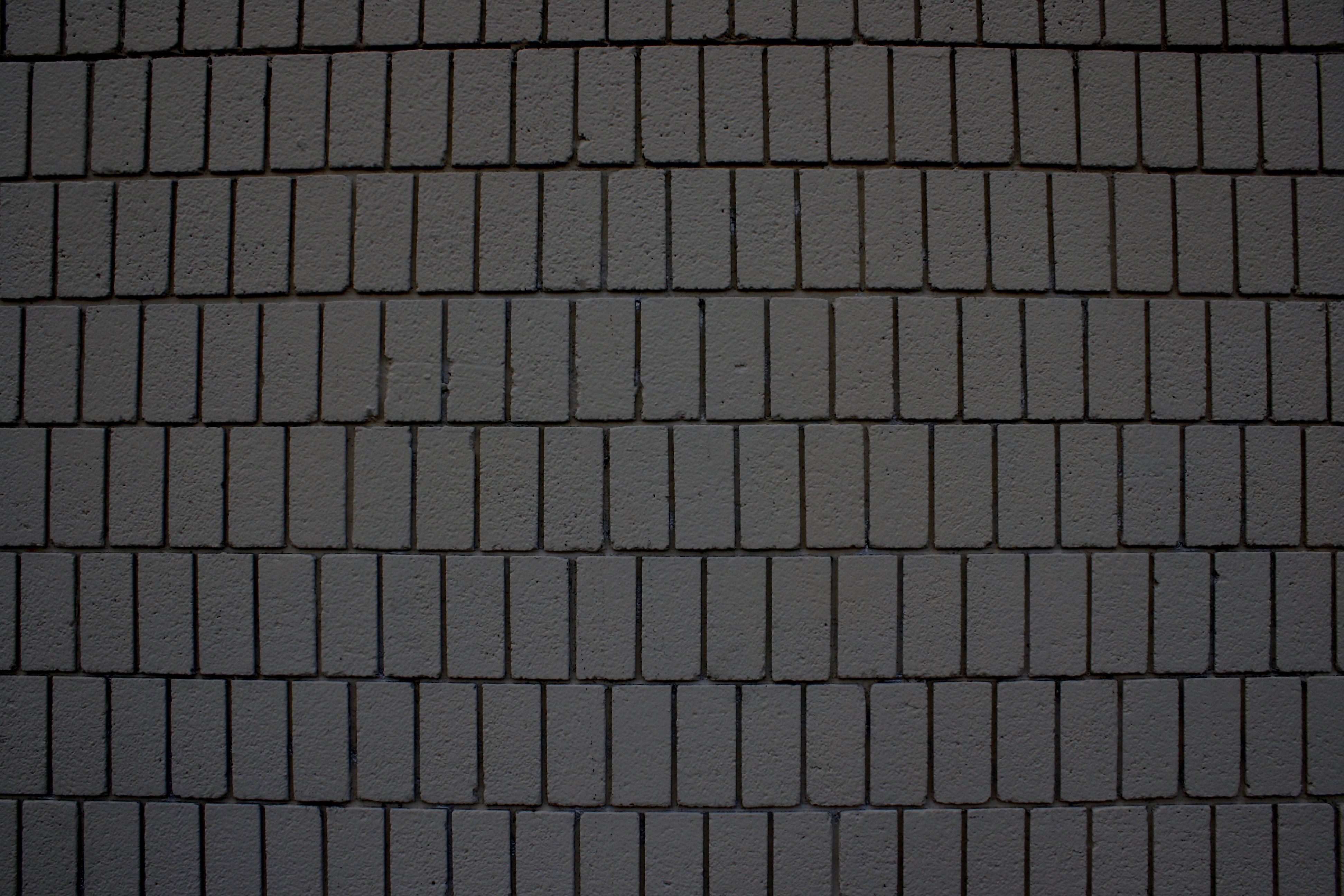 Charcoal Gray Brick Wall Texture with Vertical Bricks Picture | Free