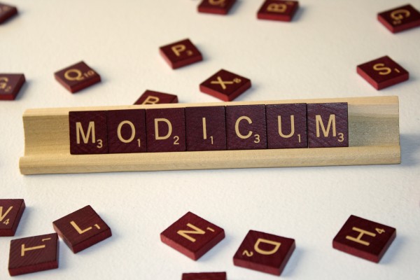 Modicum - Free High Resolution Photo of the word Modicum spelled in Scrabble tiles