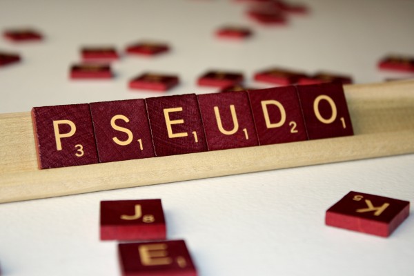 Pseudo - Free High Resolution Photo of the word Pseudo spelled in Scrabble tiles