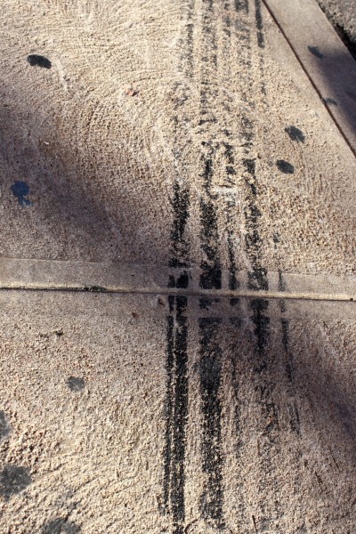 Tire Skid Marks on Sidewalk - Free High Resolution Photo