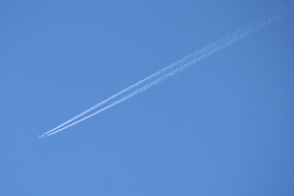 Airplane in Sky with Contrails - Free High Resolution Photo