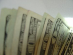 blurry photo of money - twenty dollar bills