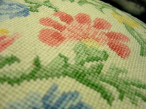 phot of embroidery needlepoint on pillow