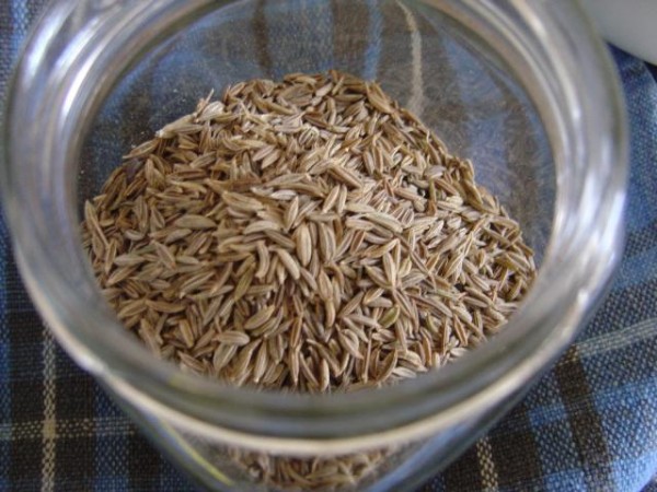 photo of cumin seeds in a glass jar