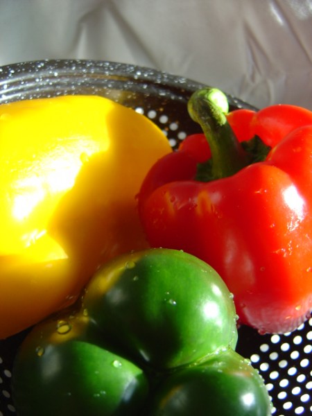 photo of three bell peppers red yellow and green