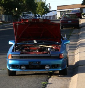 free photo of a car with its hood up