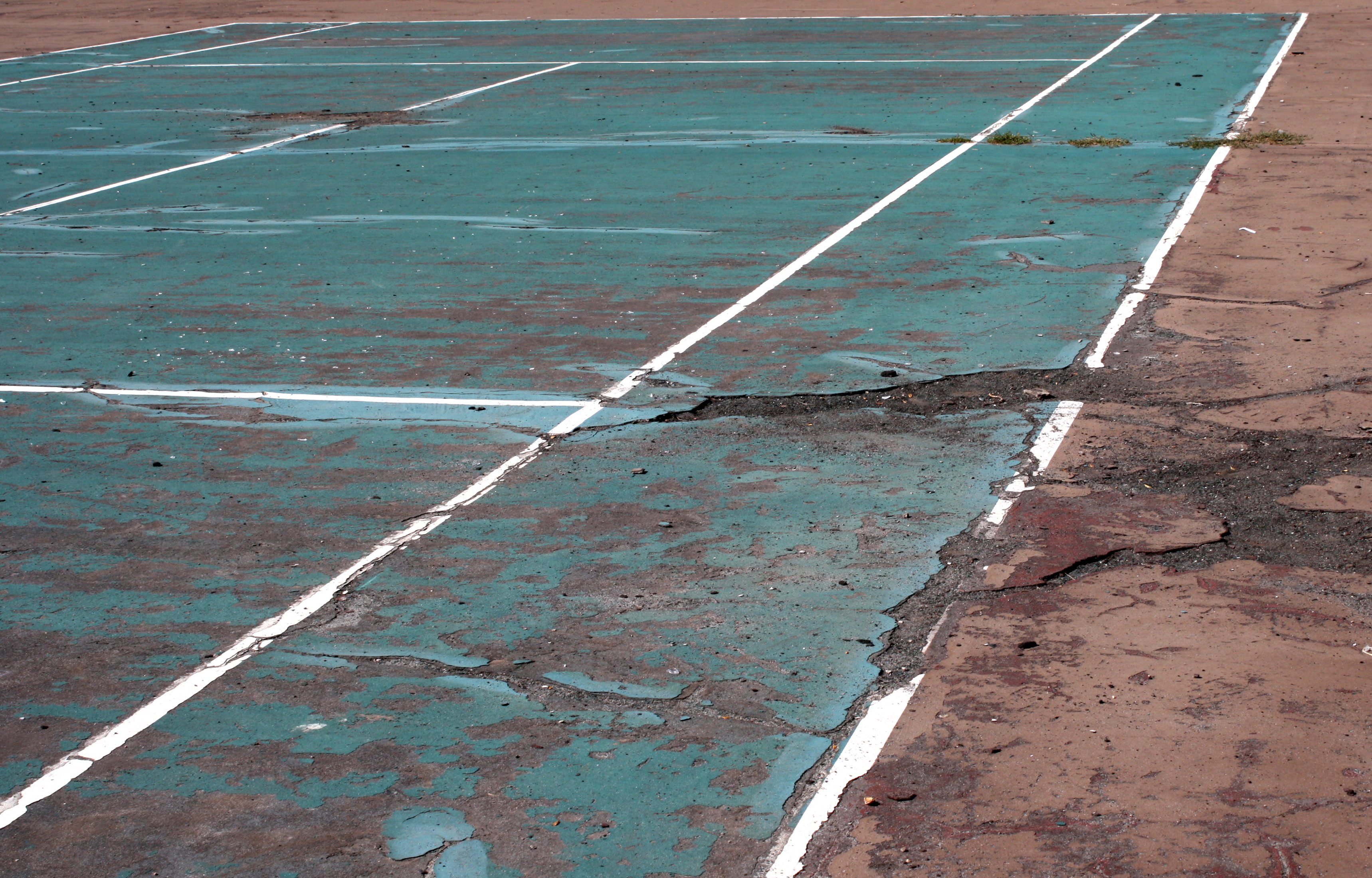 tennis_court_in_disrepair.jpg