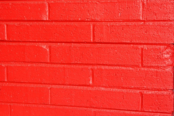 Free photo of red painted brick wall texture