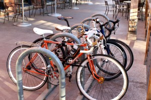 bicycles parked at bike rack - free high resolution photo