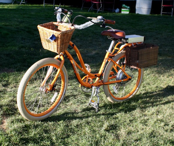 free photo of orange bicycle with wicker baskets