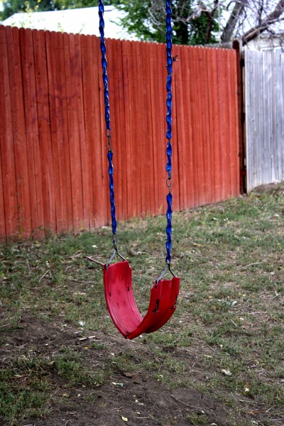 free high resolution photo of a child's red swing