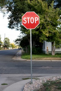 free high resolution photo of a stop sign on a neighborhood street corner