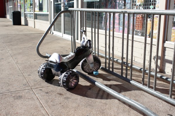 free high resolution photo of a tricycle parked at a bike rack