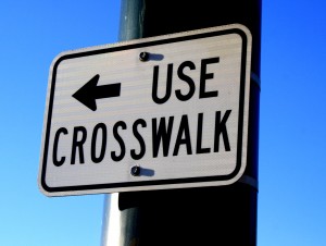 free photo of a sign reading: Use Crosswalk