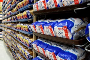 free high resolution photo of loaves of white bread on store shelves