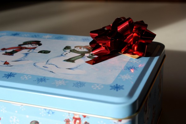 Red Bow atop Holiday Cookie Tin - free high resolution photo