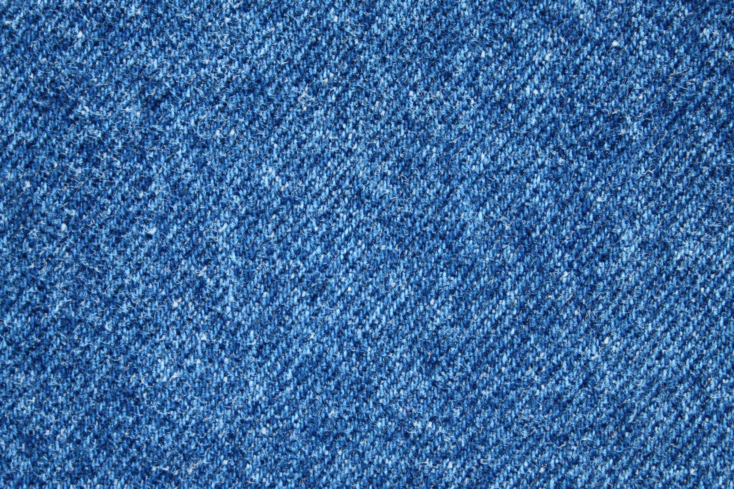 Jeans background. Light blue denim fabric texture close up. Stock Photo by  ©Kazmulka 120963378