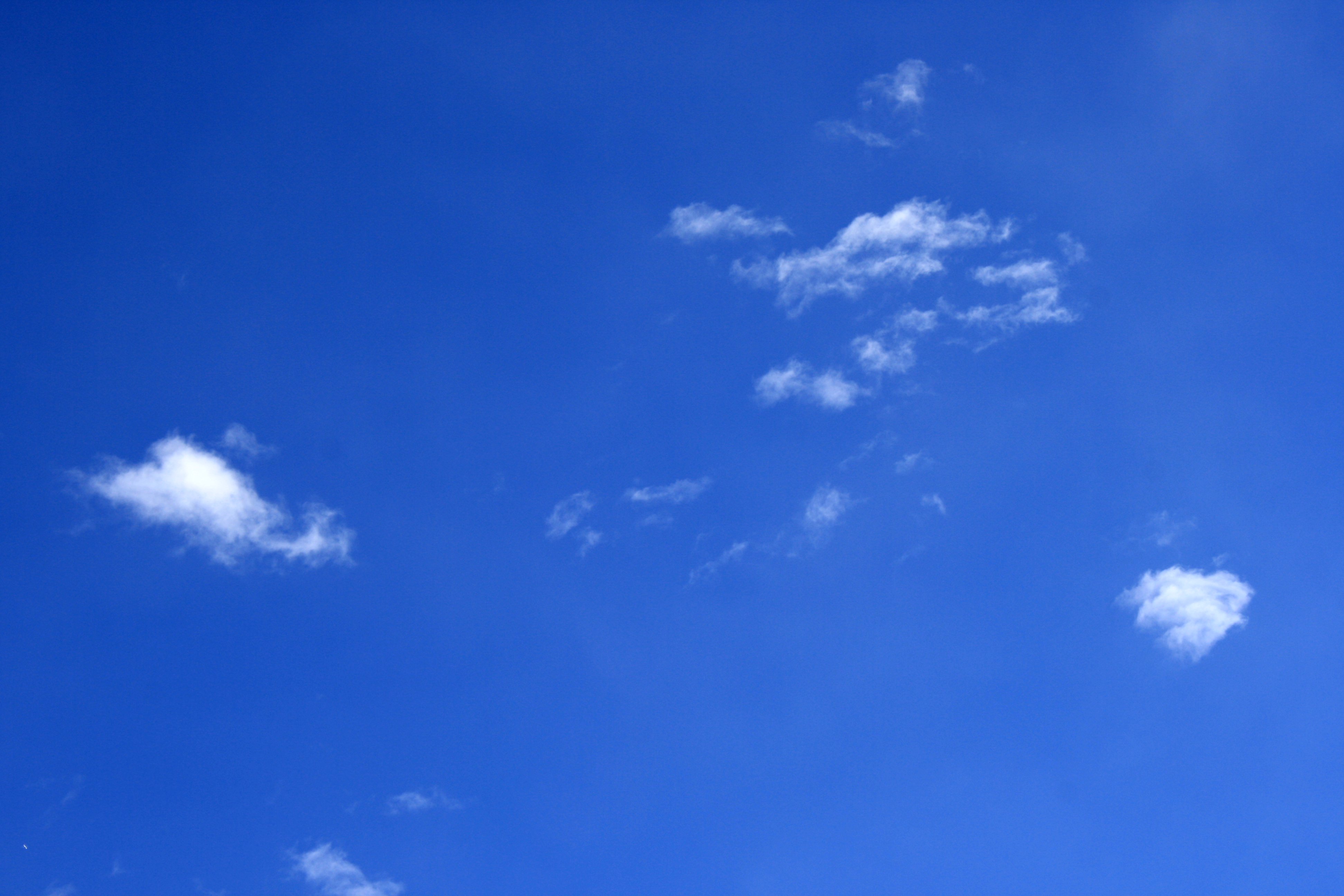 Bright Blue Sky with a Few Tiny White Clouds Picture, Free Photograph