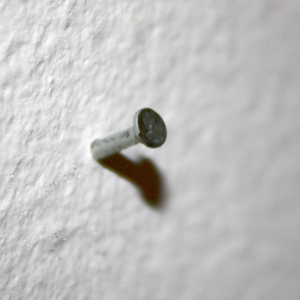 Small Nail Head Sticking out of Wall - Free High Resolution Photo