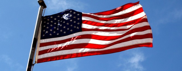 American Flag against Blue Sky - Free High Resolution Photo