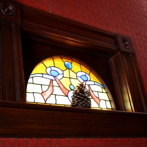 Half Circle Stained Glass Window with Pinecone on Sill - Free High Resolution Photo