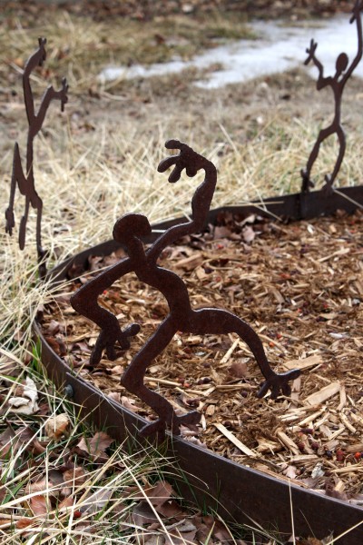 Welded Metal Tree Ring Sculpture with Dancing Men - Free High Resolution Photo