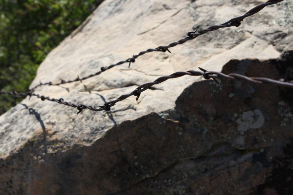 Barbed Wire Across Rock - Free High Resolution Photo