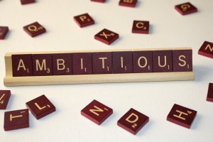 Ambitious - Free High Resolution Photo of the word Ambitious spelled in Scrabble tiles