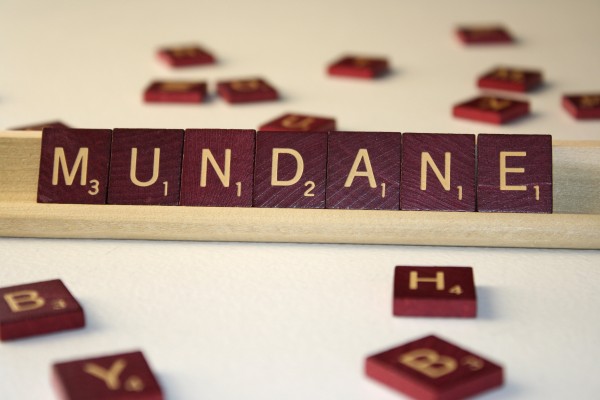 Mundane - Free High Resolution Photo of the word Mundane spelled in Scrabble tiles