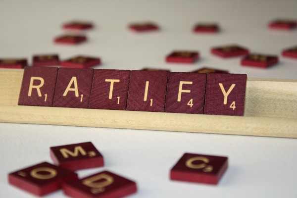 Ratify - Free High Resolution Photo of the word Ratify spelled in Scrabble tiles