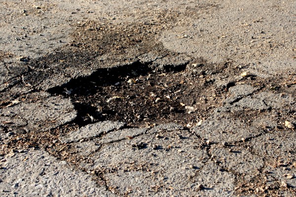 Pothole in the Road - Free High Resolution Photo