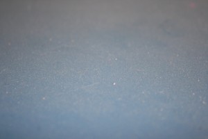 Dust on Blue Surface Close Up - Free High Resolution Photo