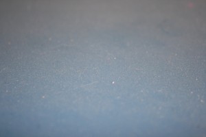 Dust on Blue Surface Close Up - Free High Resolution Photo