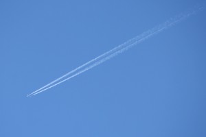 Airplane in Sky with Contrails - Free High Resolution Photo