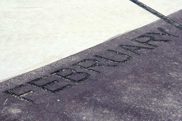 February - free high resolution photo of the word February - part of a sidewalk solar calendar