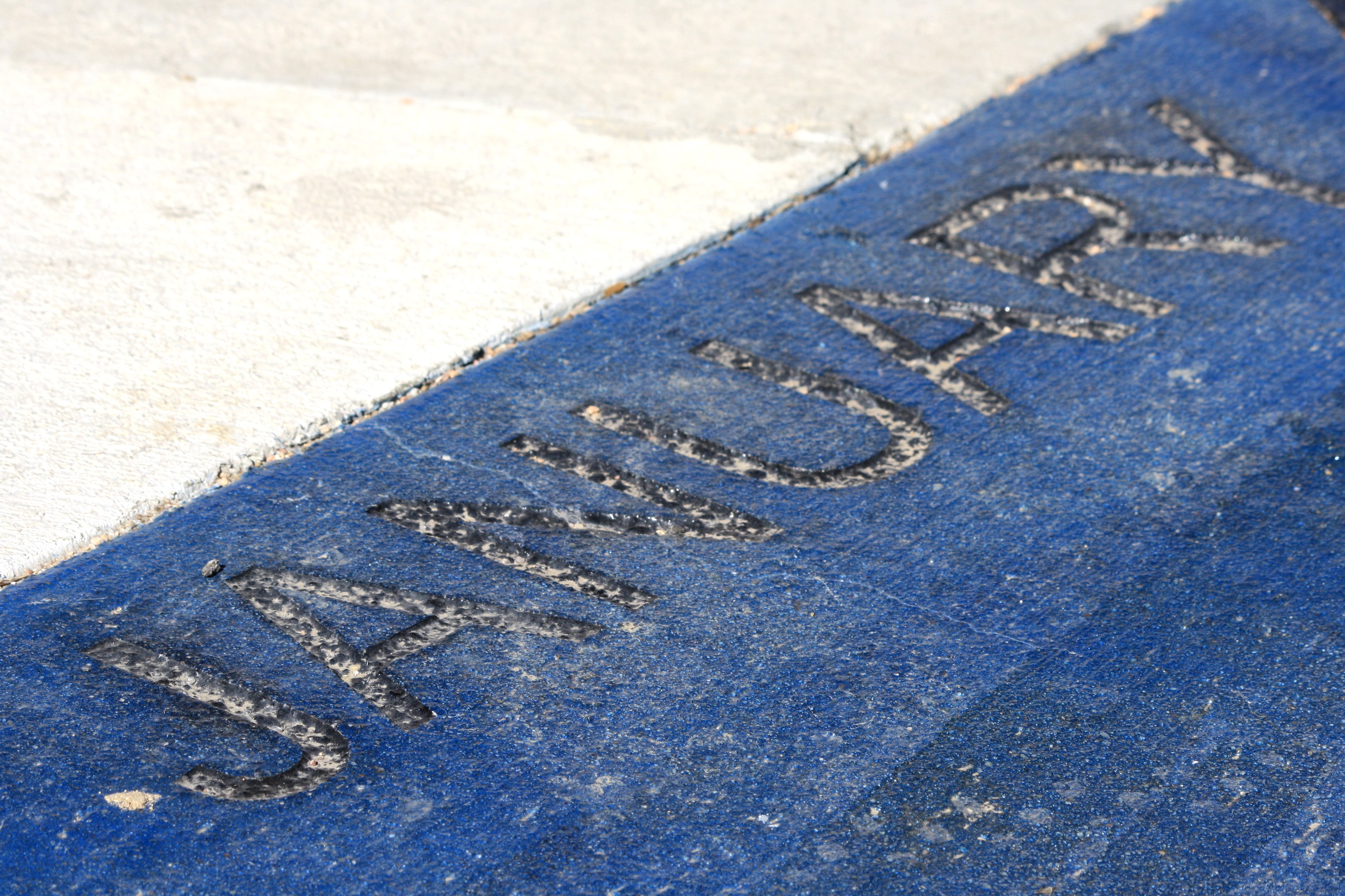 January - Free high resolution photo of the word January - part of a sidewalk solar calendar