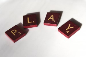 Play - free high resolution photo of Scrabble letter tiles spelling the word play